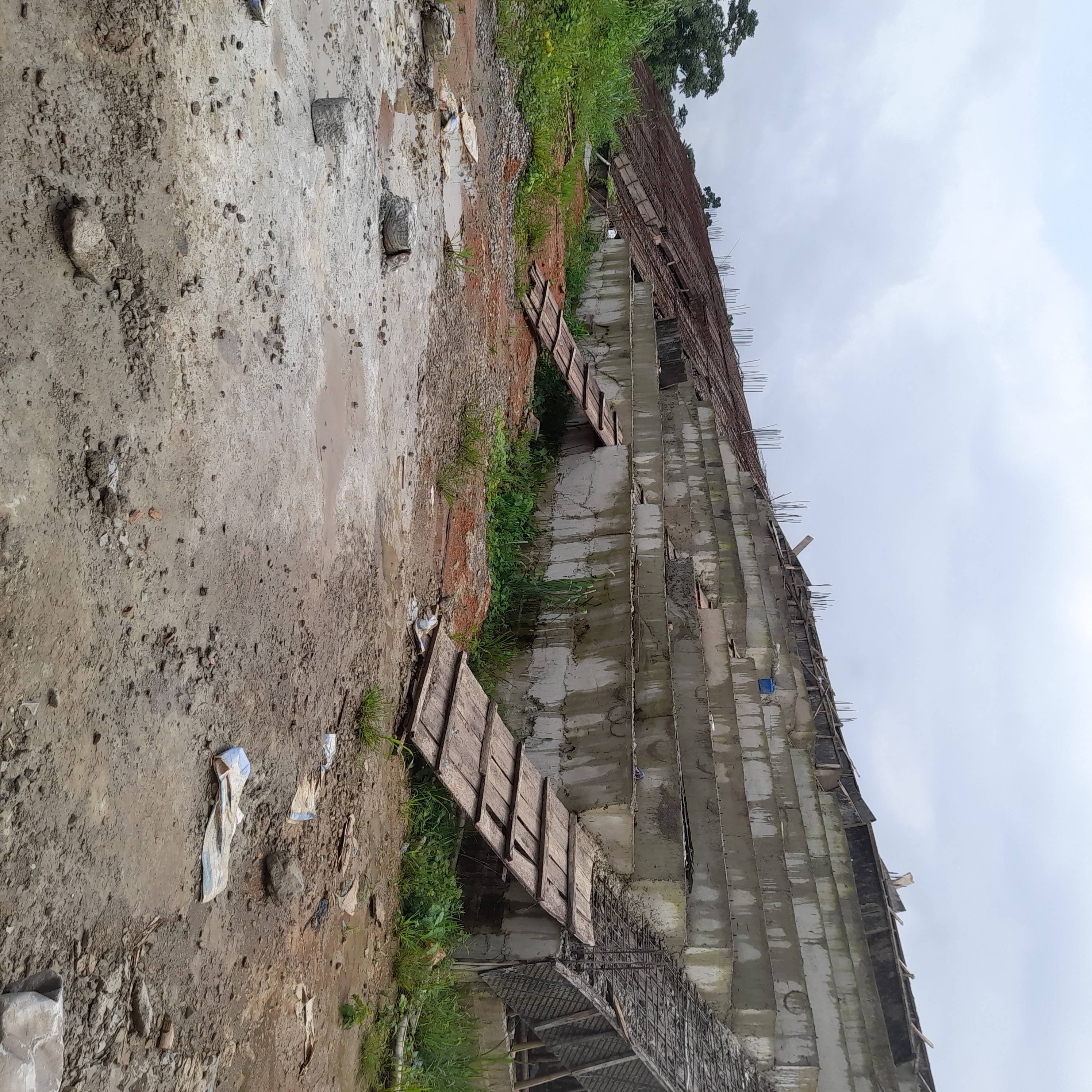 Construction Of Football Field, Drainage And Grassing And 30 X
30 M Pavillon