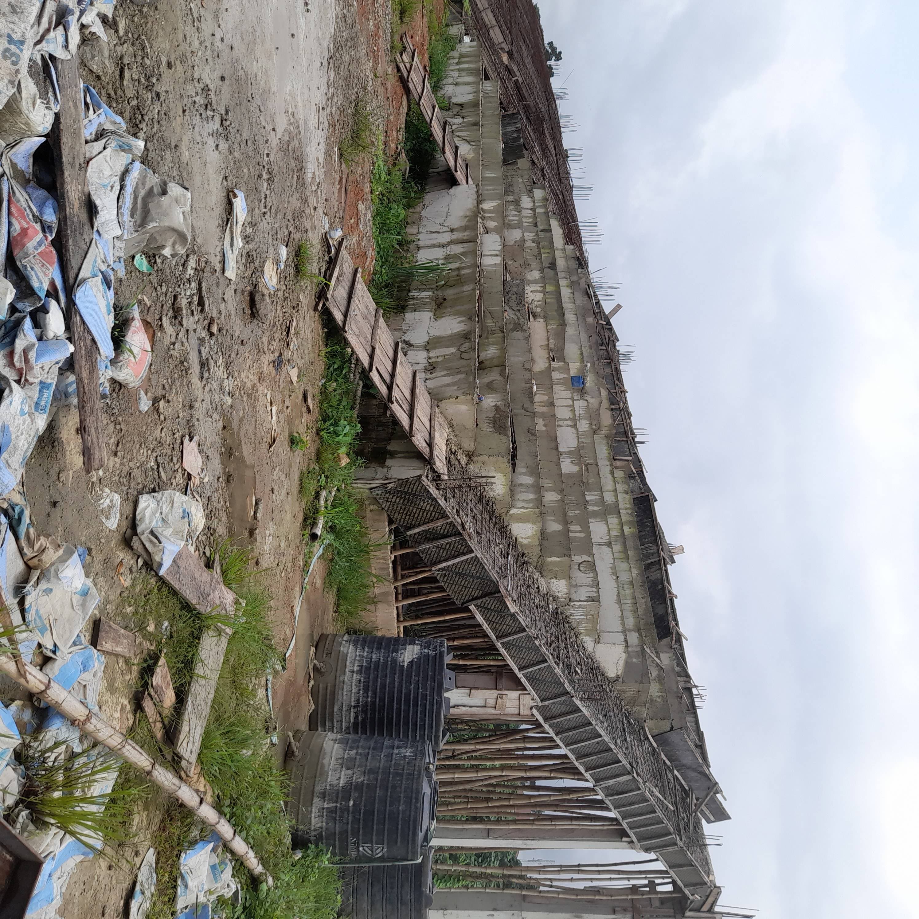 Construction Of Football Field, Drainage And Grassing And 30 X
30 M Pavillon